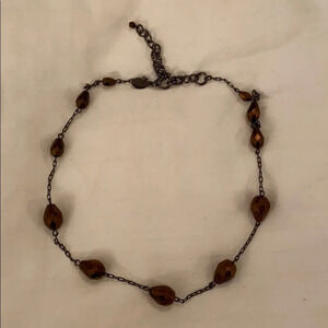 Brown beaded necklace with black chain